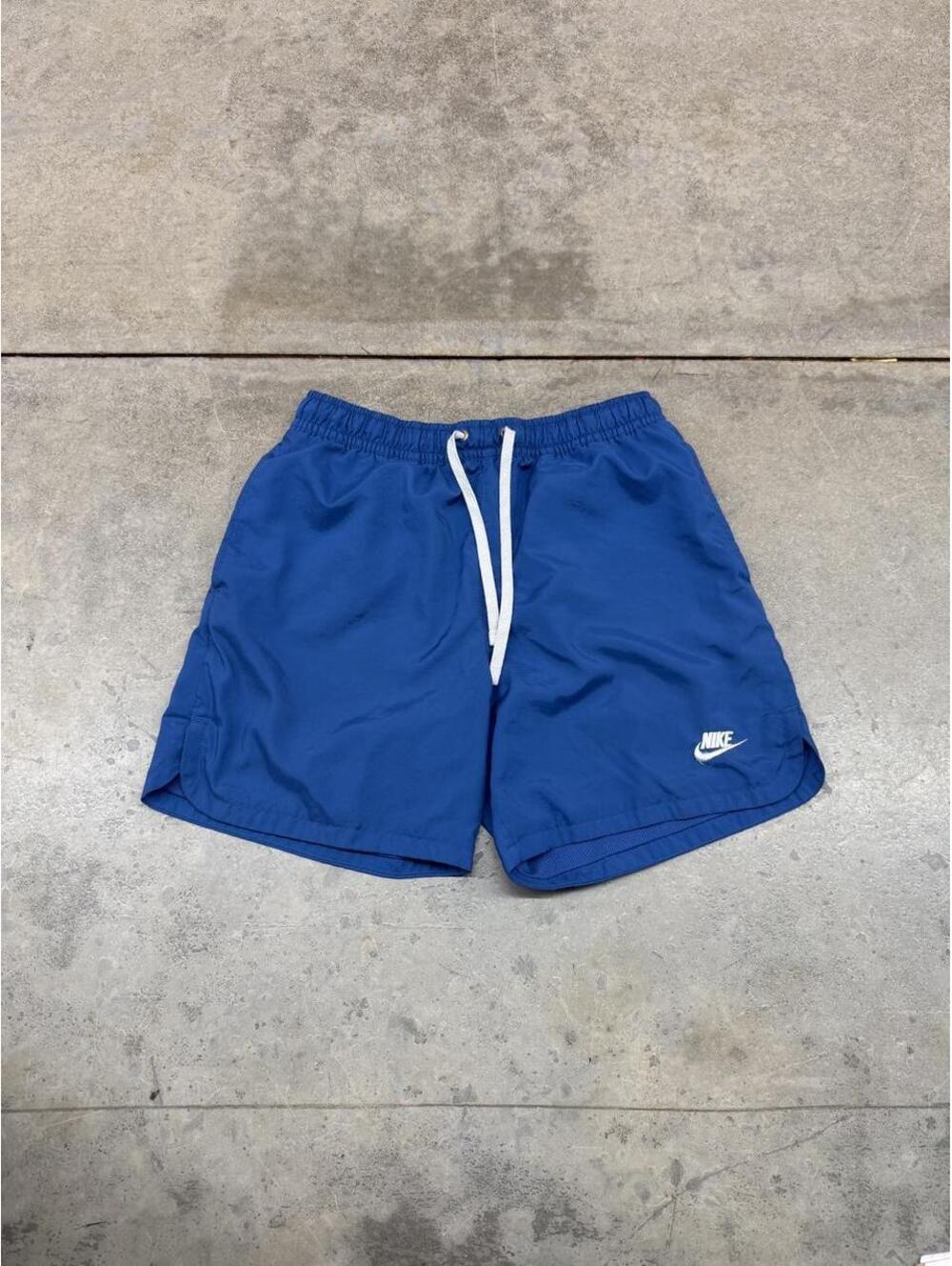 vintage nike blue and white small swoosh nylon shorts size small